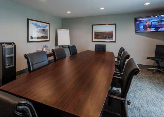 Image of the Rincon Room with plenty of chairs and meeting space located at Carpinteria Express